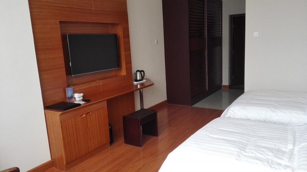 Weihai Times Business Hotel Rom bilde